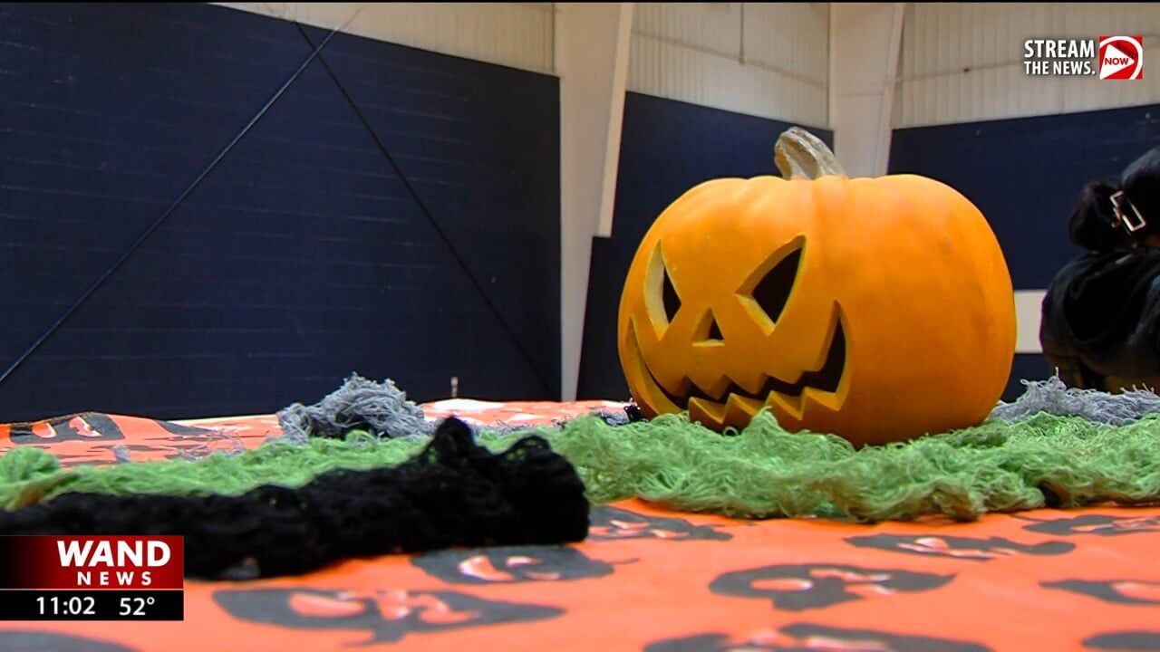 UIS students trade candy for cans in Halloween tradition